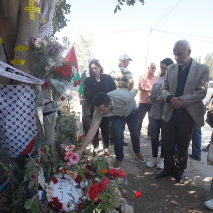 JENIN, WEST BANK, PALESTINE - 2022/05/18: Palestinians lay flowers at the site where Al-Jazeera correspondent Shireen Abu Akleh was killed in the city of Jenin in the occupied West Bank. Shireen Abu Akleh was shot dead by the Israeli army while covering the raid on the city. (Photo by Nasser Ishtayeh/SOPA Images/LightRocket via Getty Images)