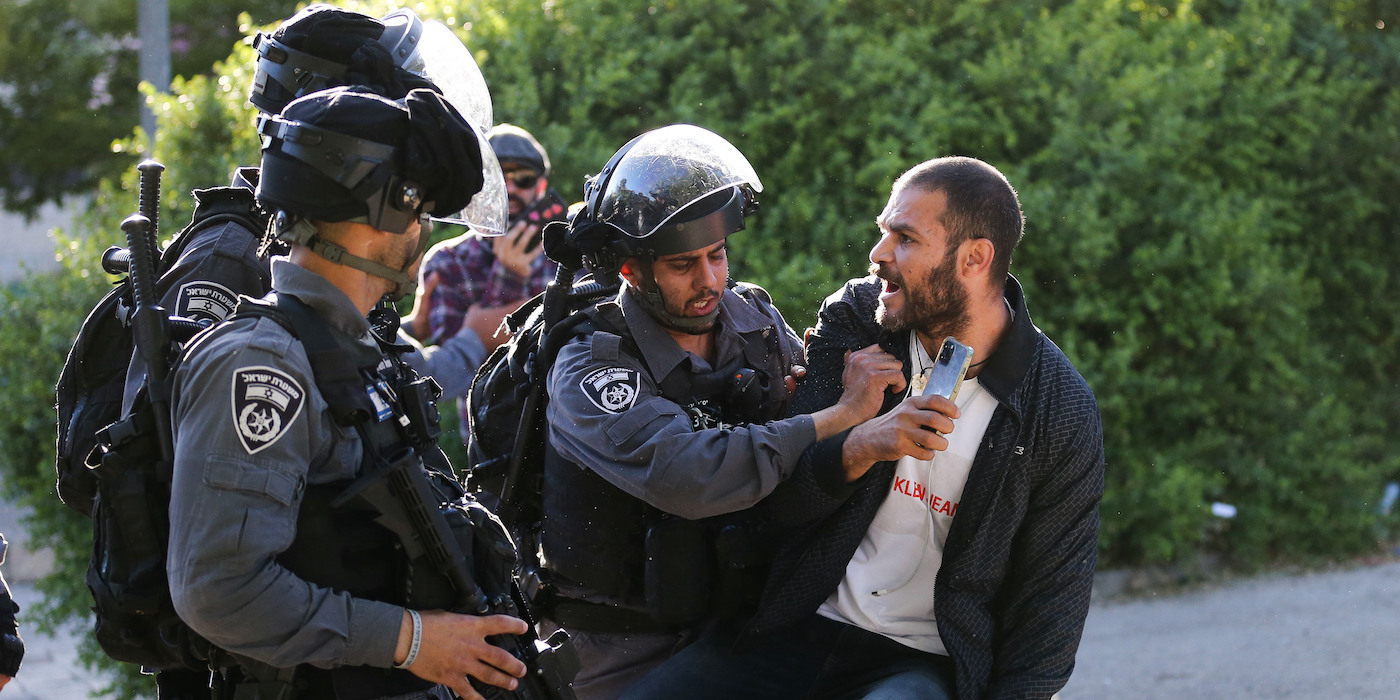 JERUSALEM - MAY 22: Israeli forces intervene in a demonstration by Palestinians on a call from Sheikh Jarrah locals in front of an Israeli forces' checkpoint in Sheikh Jarrah neighborhood of East Jerusalem on May 22, 2021. (Photo by Mostafa Alkharouf/Anadolu Agency via Getty Images)