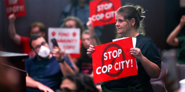 FILE - Protestors reacts before council members voted 11-4 to approve legislation to fund the Atlanta Public Safety Training Center, June 6, 2023, in Atlanta. Sixty-one people have been indicted in Georgia on racketeering charges following a long-running state investigation into protests against a proposed police and training facility in the Atlanta area that critics call “Cop City.” The Tuesday, Aug. 29, 2023, indictment under the state’s racketeering law was released by Fulton County officials on Tuesday, Sept. 5. (Jason Getz/Atlanta Journal-Constitution via AP, File)