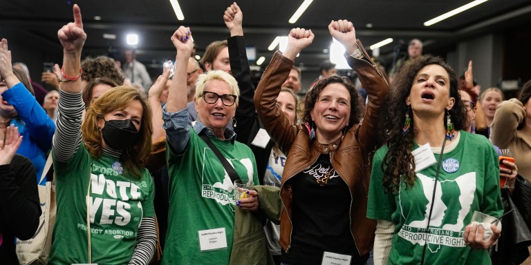 From left, Sandra Feihrer, Lauren Angler, Shannon Gallagher and Tina Gasbarra Larsen celebrate with other supporters at an Issue 1 watch party Tuesday, Nov. 7, 2023, in Columbus Ohio. Ohio voters have approved a constitutional amendment that guarantees the right to abortion and other forms of reproductive health care. The outcome of Tuesday’s intense, off-year election was the latest blow for abortion opponents.  (AP Photo/Sue Ogrocki)