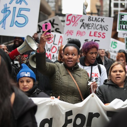 CHICAGO, IL - APRIL 04:  Demonstrators protest for higher wages and better working conditions on the 49th anniversary of the murder of Dr. Martin Luther King Jr. on April 4, 2017 in Chicago, Illinois. King, a clergyman and civil rights leader was killed in Memphis, Tennessee, on April 4, 1968 while in town supporting striking black city sanitation workers who had walked off their jobs to protest unequal wages and working conditions.  (Photo by Scott Olson/Getty Images)