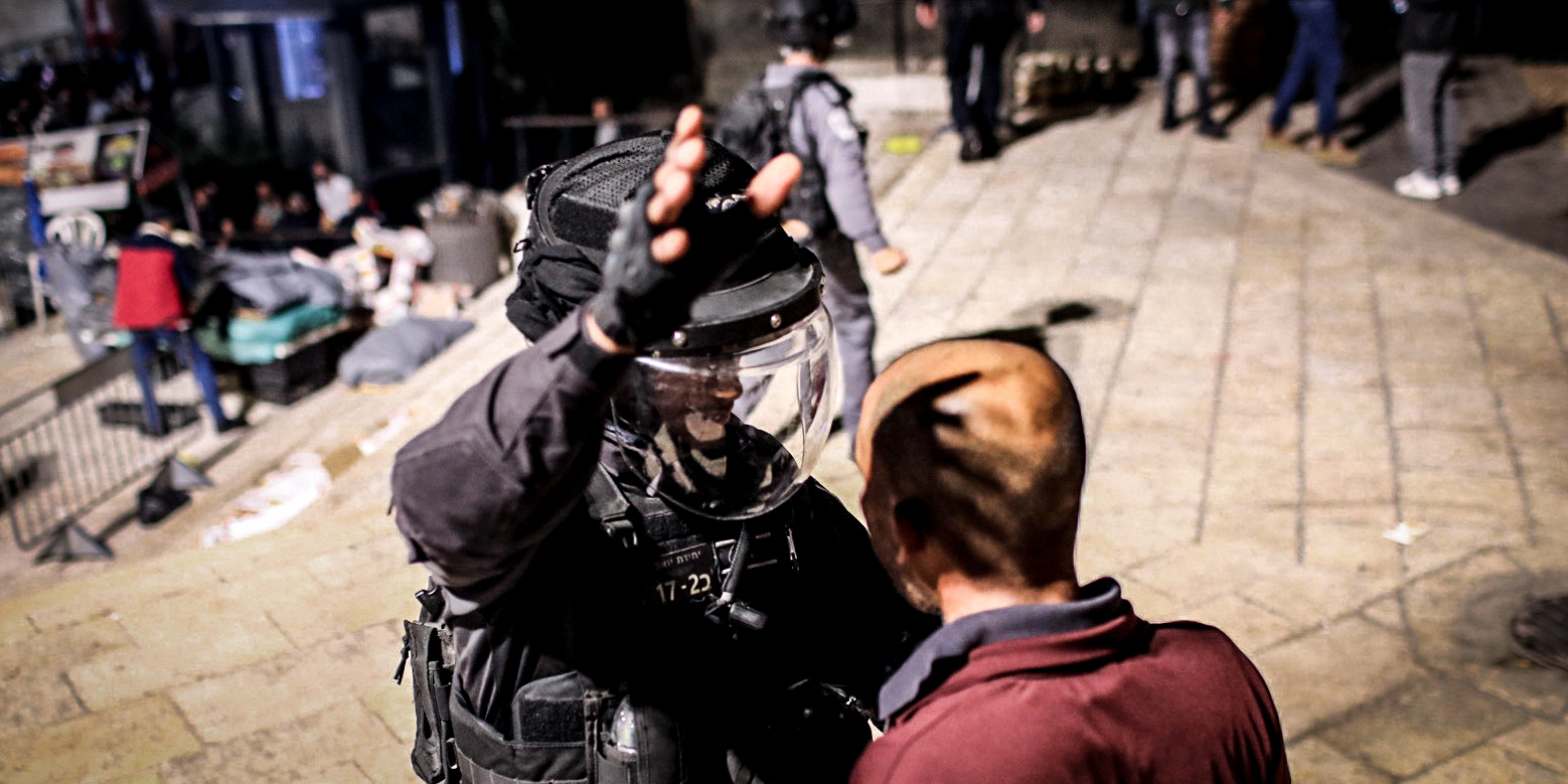 07 May 2021, Israel, Jerusalem: An Israeli officer confronts a man during a demonstration near the Damascus gate of Jerusalem's old city against the planned eviction process for the Palestinians in the Sheikh Jarrah neighbourhood. Photo: Ilia Yefimovich/dpa (Photo by Ilia Yefimovich/picture alliance via Getty Images)