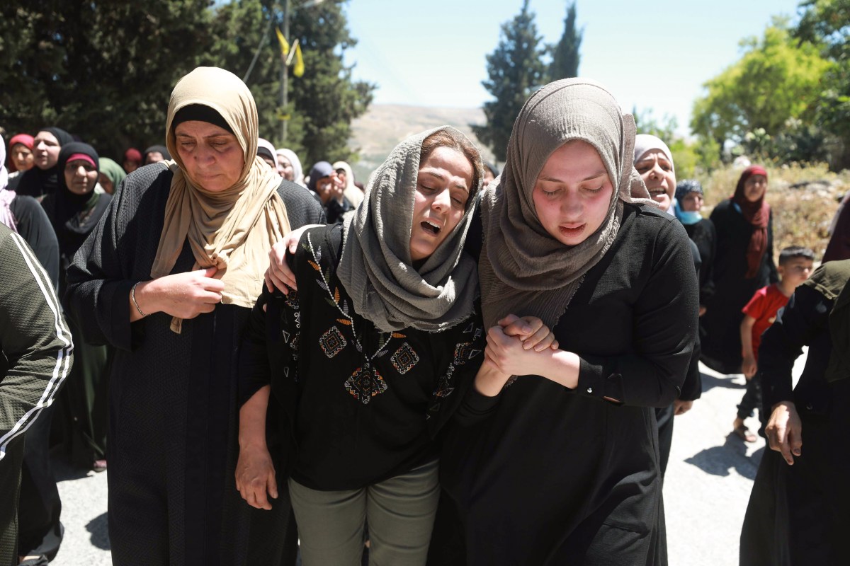 NABLUS, WEST BANK - MAY 15: People attend a funeral held for 20-year-old Palestinian Husam Asayra, killed in a demonstration in West Bank against Israeli attacks as the Israeli forces clashed with protestors to disperse their rallies, in Nablus, West Bank on May 15, 2021. (Photo by Issam Rimawi/Anadolu Agency via Getty Images)