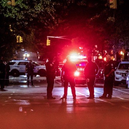 New York City Police Department (NYPD) officers investigate a shooting in the Brooklyn borough of New York, U.S., on Wednesday, August 4, 2021. New York Democratic mayoral nominee Eric Adams said after a meeting with President Joe Biden that the availability of handguns is driving increases in violent crime in the U.S., and that too much attention is paid to police practices. Photographer: Michael Nagle/Bloomberg via Getty Images