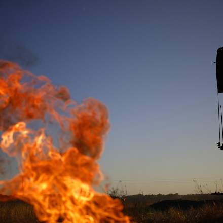 A natural gas flare burns near an oil pump jack at the New Harmony Oil Field in Grayville, Illinois, US, on Sunday, June 19, 2022. Top Biden administration officials are weighing limits on exports of fuel as the White House struggles to contain gasoline prices that have topped $5 per gallon. Photographer: Luke Sharrett/Bloomberg via Getty Images