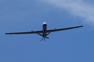 A General Atomics MQ-9 Reaper unmanned aerial vehicle drone performs a fly-over during the Bastille Day military parade on the Champs-Elysees avenue in Paris on July 14, 2022. (Photo by Ludovic MARIN / AFP) (Photo by LUDOVIC MARIN/AFP via Getty Images)