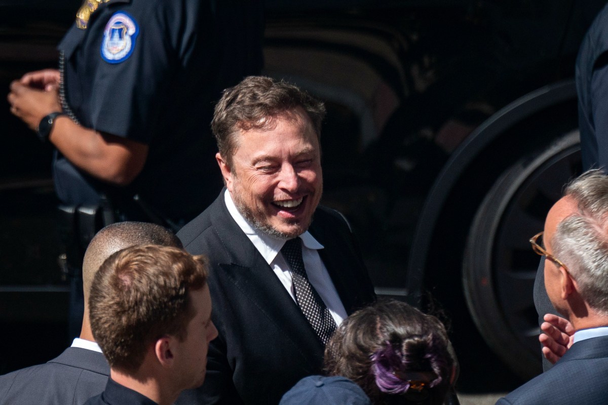 Elon Musk, chief executive officer of Tesla, speaks to members of the media following Senate bipartisan Artificial Intelligence (AI) Insight Forum on Capitol Hill in Washington, DC, US, on Wednesday, Sept. 13, 2023. The gathering is part of the Senate majority leader's strategy to give Congress more influence over the future of artificial intelligence as it takes on a growing role in the professional and personal lives of Americans. Photographer: Al Drago/Bloomberg via Getty Images