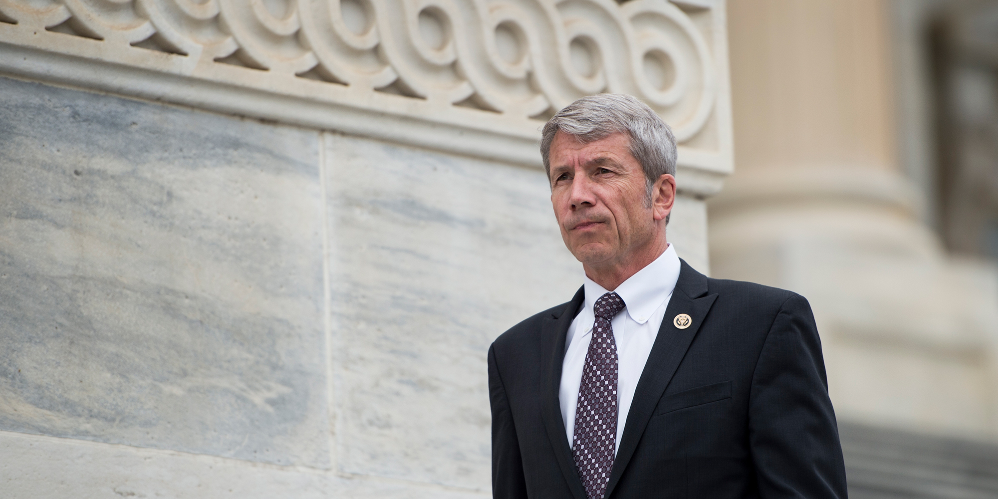 Rep. Kurt Schrader, D-Ore. walks down the House steps.