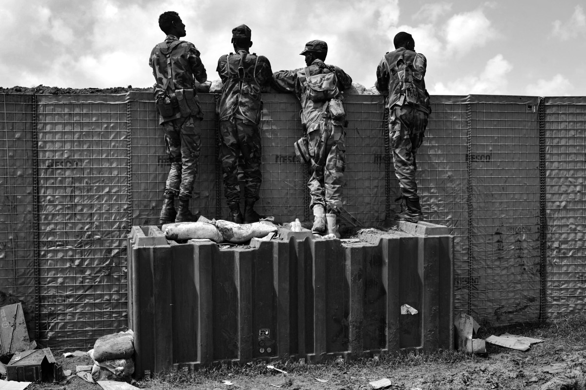 Somali soldiers are on patrol at Sanguuni military base, where an American special operations soldier was killed by a mortar attack on June 8, about 450 km south of Mogadishu, Somalia, on June 13, 2018. - More than 500 American forces are partnering with African Union Mission to Somalia (AMISOM) and Somali national security forces in counterterrorism operations, and have conducted frequent raids and drone strikes on Al-Shabaab training camps throughout Somalia. (Photo by Mohamed ABDIWAHAB / AFP)        (Photo credit should read MOHAMED ABDIWAHAB/AFP via Getty Images)