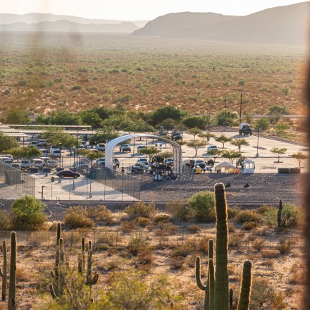 Why, Ariz. 7/20/23: roughly 50 migrants held outside at the Ajo Border Patrol Station during record breaking heatwave in Why, Ariz. on Thursday, July 20, 2023. (Ash Ponders for The The Intercept)